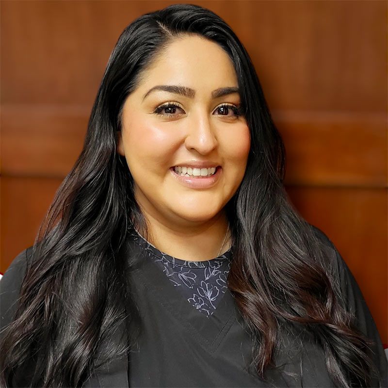 Dulce, the lead dental assistant at Portage Northern Dental